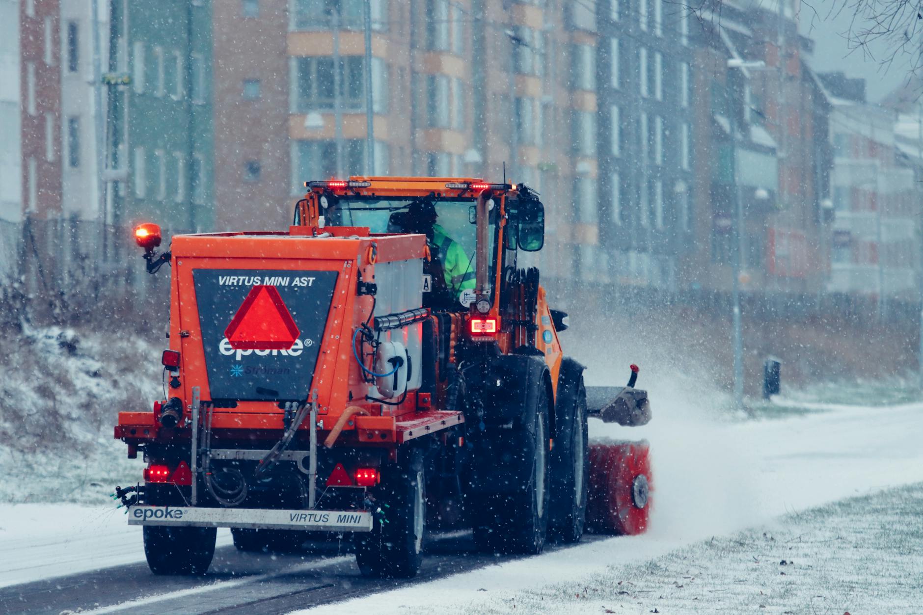 Winter snow removal service driveway with plow equipment